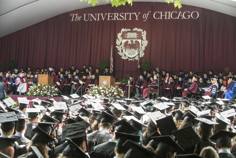 The graduates face the stage at the 523rd University of Chicago Convocation.