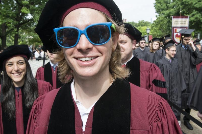 Graduates stay cool during the University's outdoor convocation.