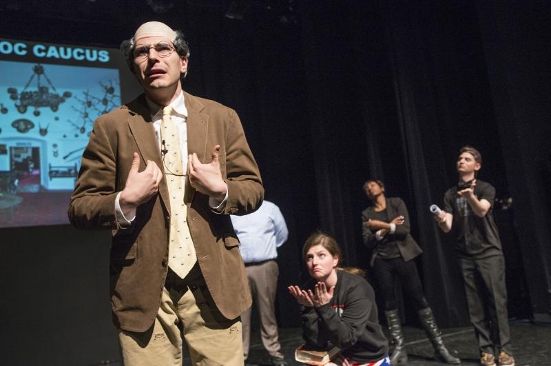 A student playing Professor Todd Henderson talks about why he would make a great dean.