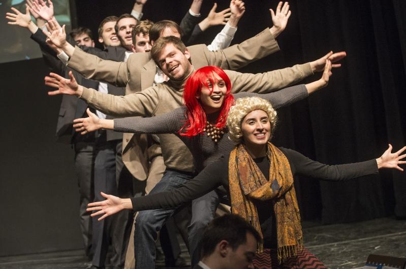 Students playing various professors sing, "We Need a Dean."