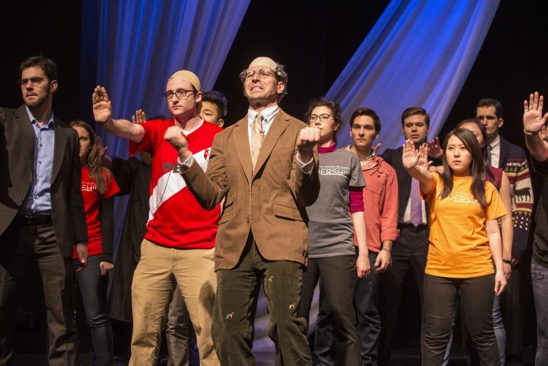 In front, Peter Hegel, ’17, portrays Professor Todd Henderson.