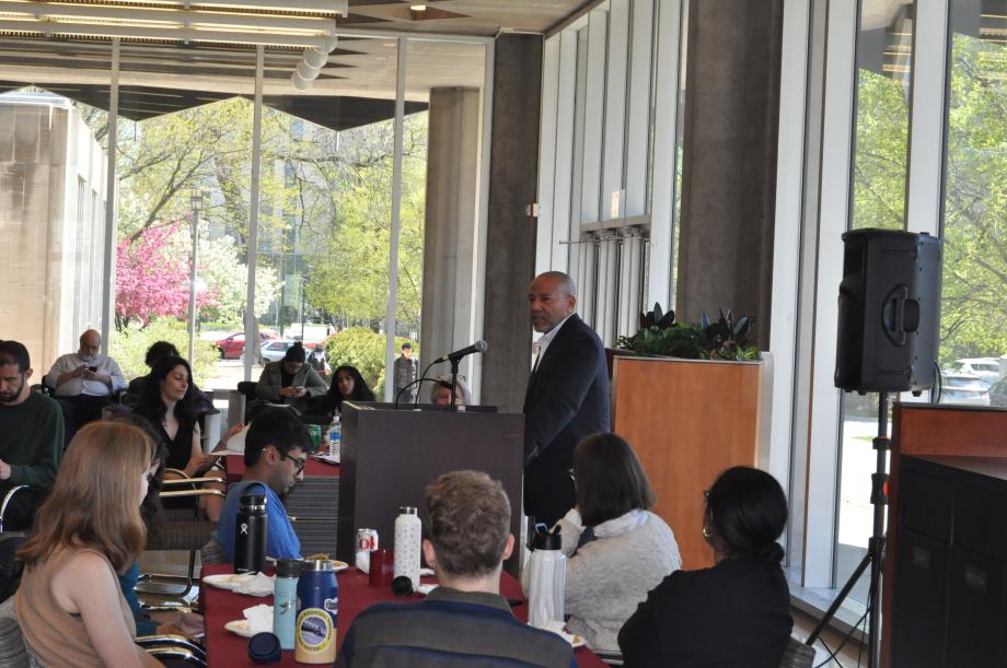 In the South Green Lounge, the keynote speaker looks out into the audience