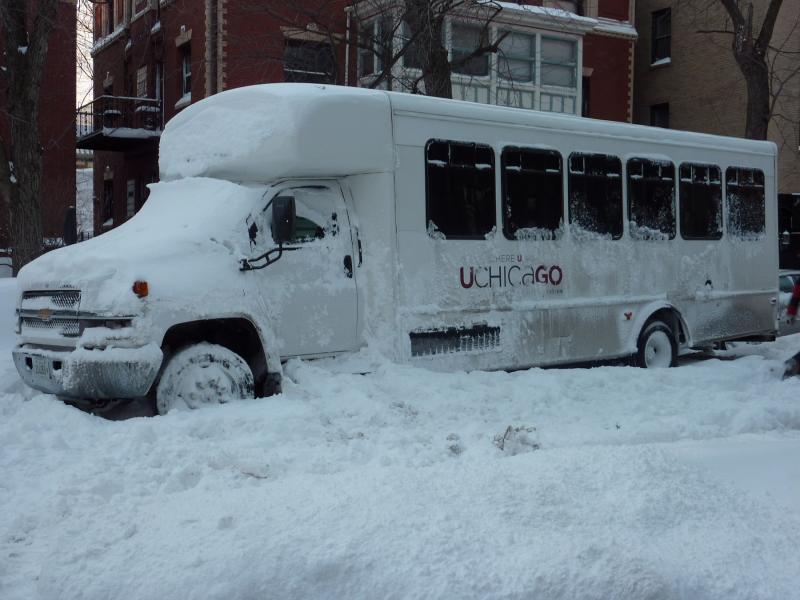 A snowbound UChicago shuttle. (Photo by Chengyao Zhou '11 )