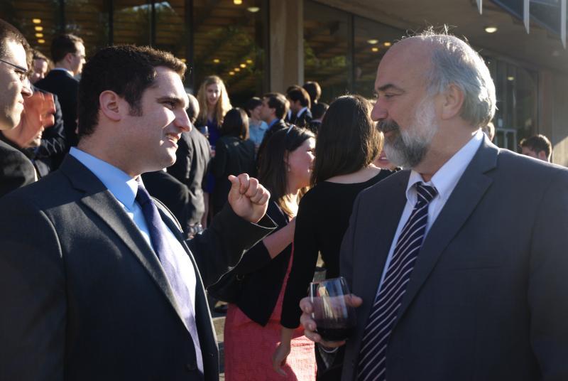 Professor Randall Schmidt and a student before dinner.