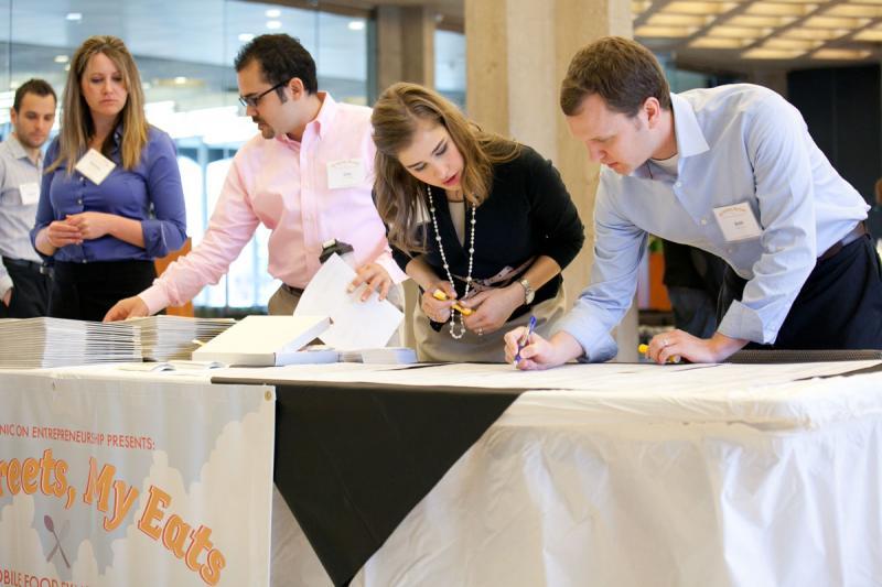 The Institute for Justice and Chicago Law students welcome attendees. 