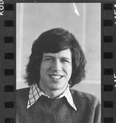 During his years as a student, Geoffrey Stone served as editor in chief of the Law Review. Stone, with shoulder length hair, smiles at the camera.
