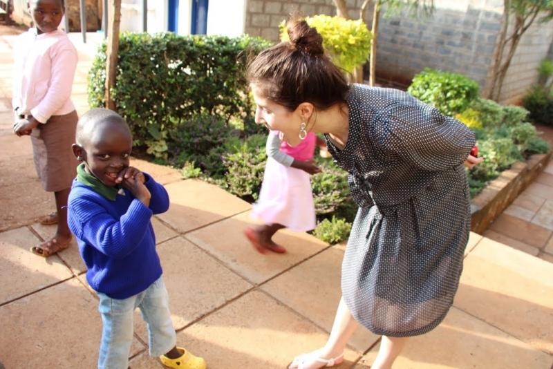 Christine Bonomo, '14, and a new young friend. 