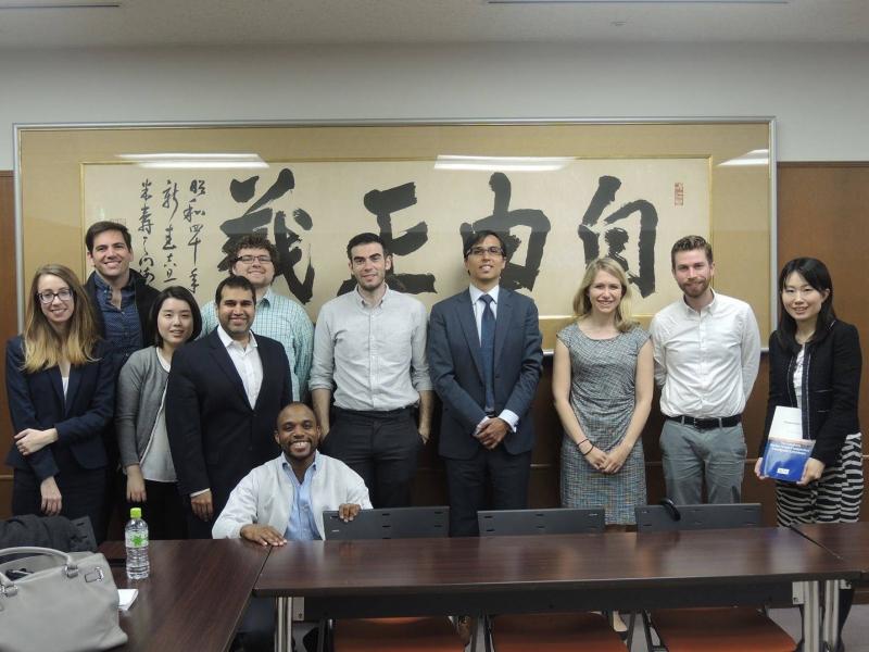 The group gathered for a photo after a discussion of the Japanese governmental compensation program established after the Fukushima nuclear disaster.