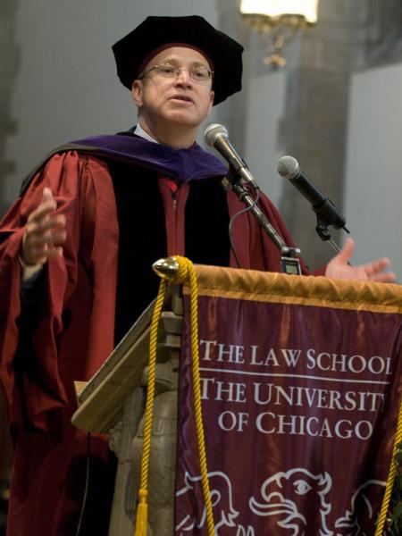 Gary A. Haugen (JD,'91), President and CEO of the International Justice Mission, addresses the graduates after receiving the Distinguished Citizen Award from Dean Levmore for his work with the human rights agency.