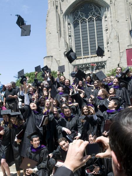 LLM graduates celebrate after the Hooding Ceremony in Rockefeller Chapel.