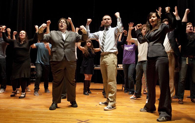 The musical cast showing their strength. The musical cast showing their strength.