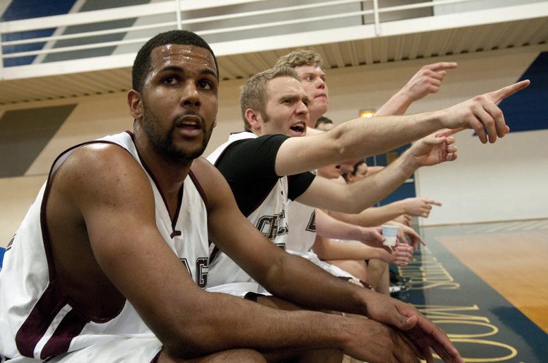 Jason Owens, '11, takes a breather on the bench.