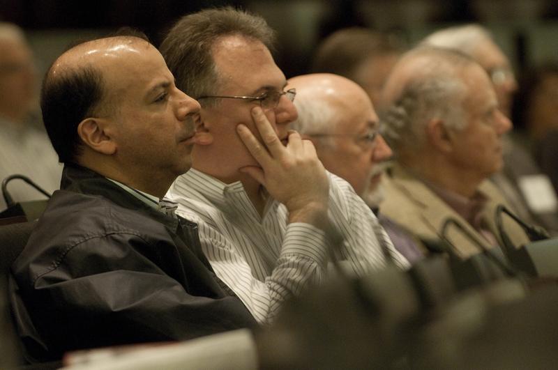 Alumni listening to the talk in the Law School's Auditorium.