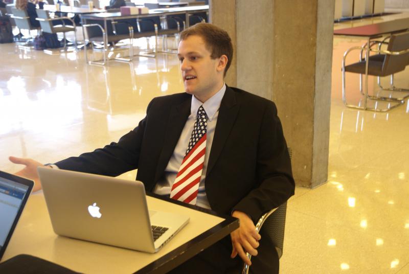 A student with patriotic spirit in the Green Lounge. 