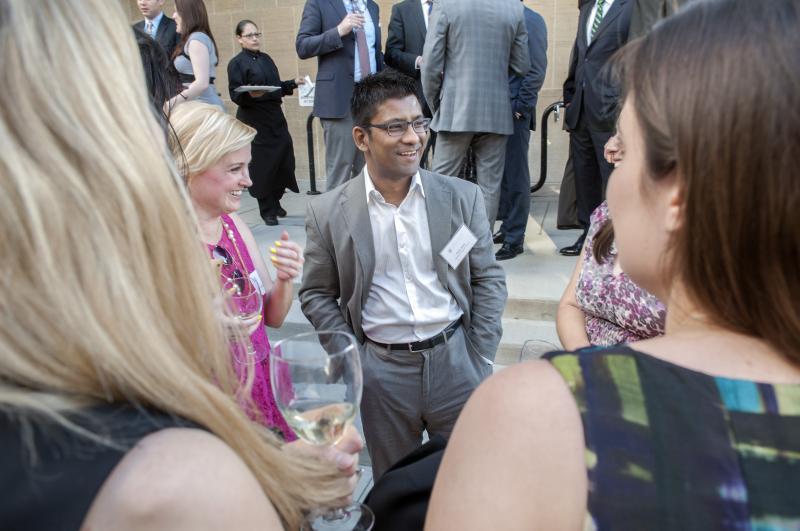 Professor Aziz Huq talked with students.