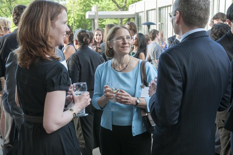 Professors Alison LaCroix, Julie Roin, and Thomas Miles before the dinner. 