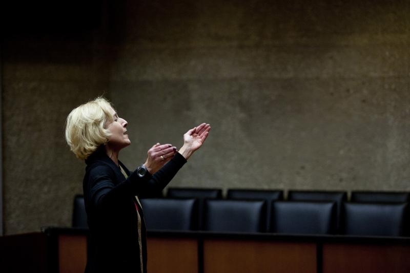 Martha Nussbaum, co-organizer, opened the performances with a song.