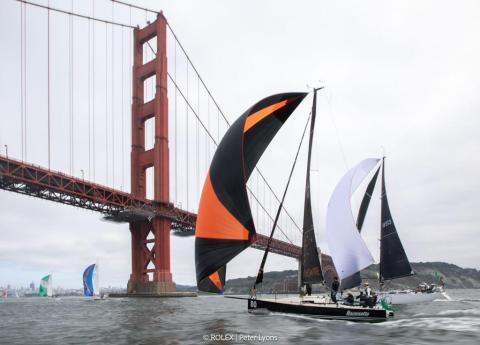 A sailboat in front of the Golden Gate Bridge in San Francisco