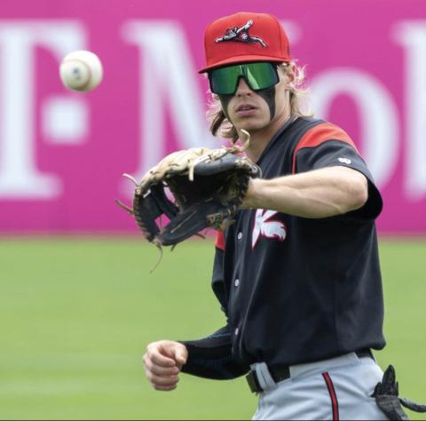 Simon Whiteman catches a baseball